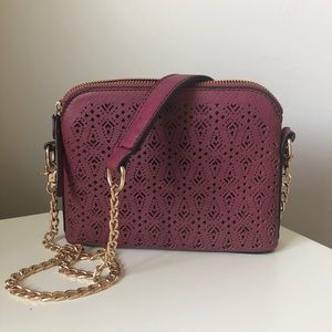 Francesca’s maroon crossbody handbag
